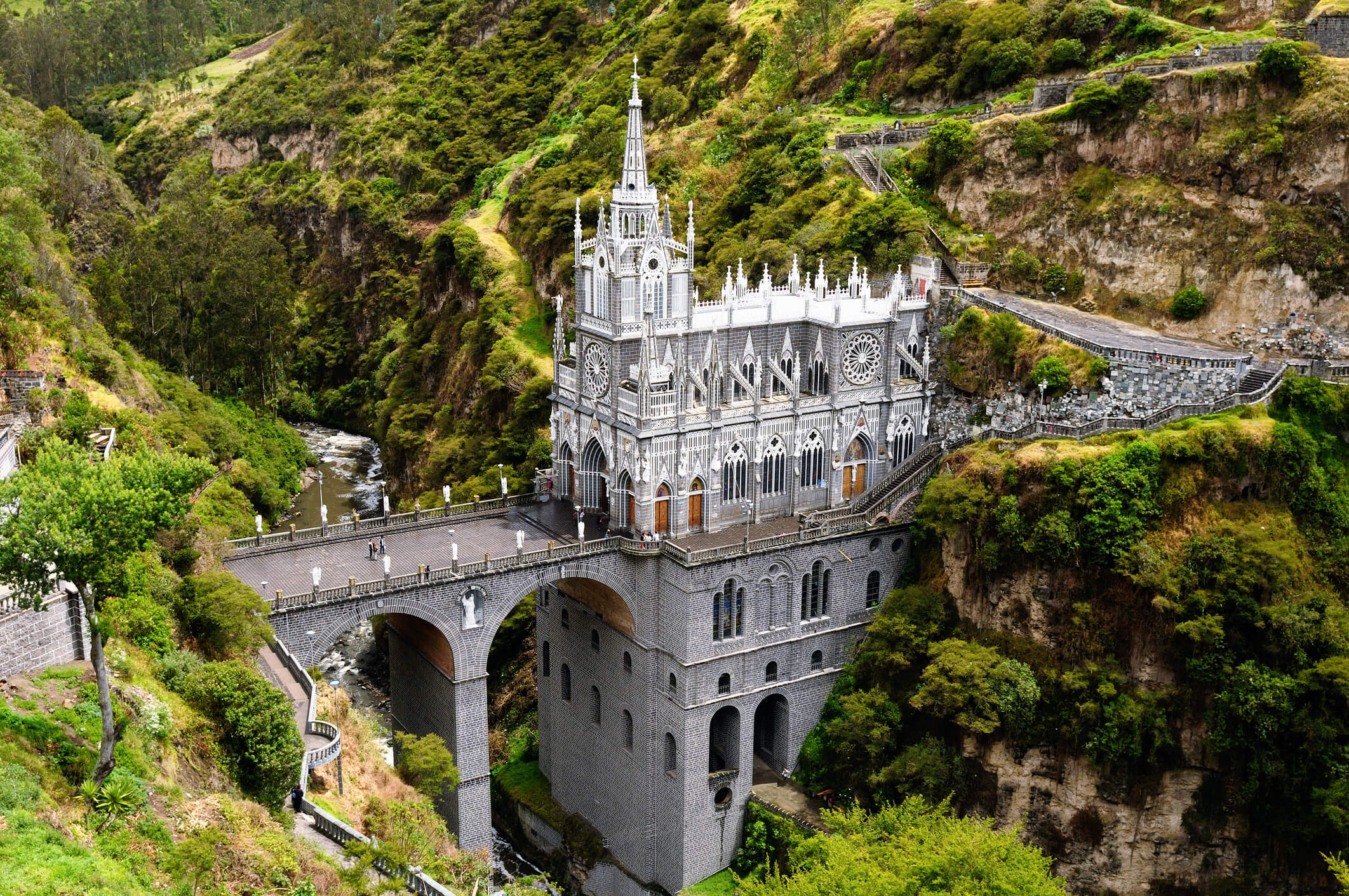 Gothic revival cathedral built into a cliffside.