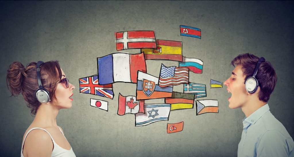 homebased agent speaking in front of flags of different countries