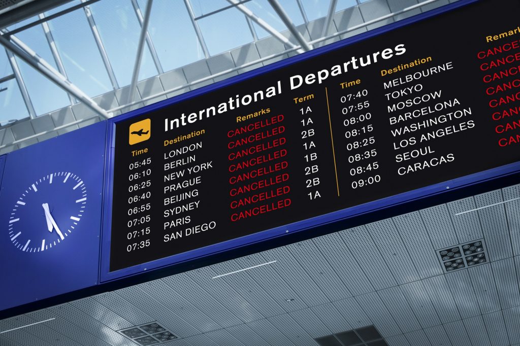 cancelled flights on airport board