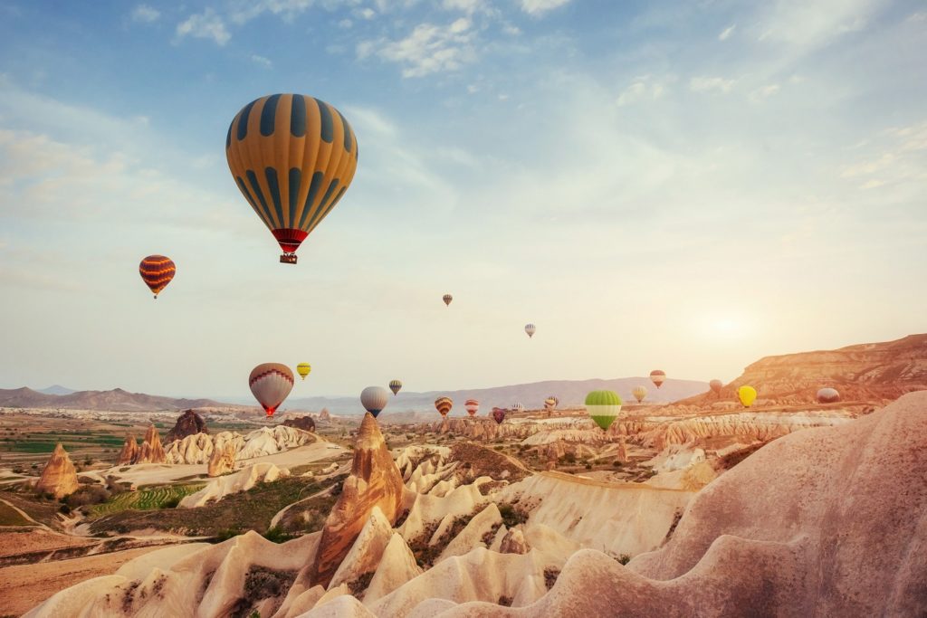 balloons floating over goreme