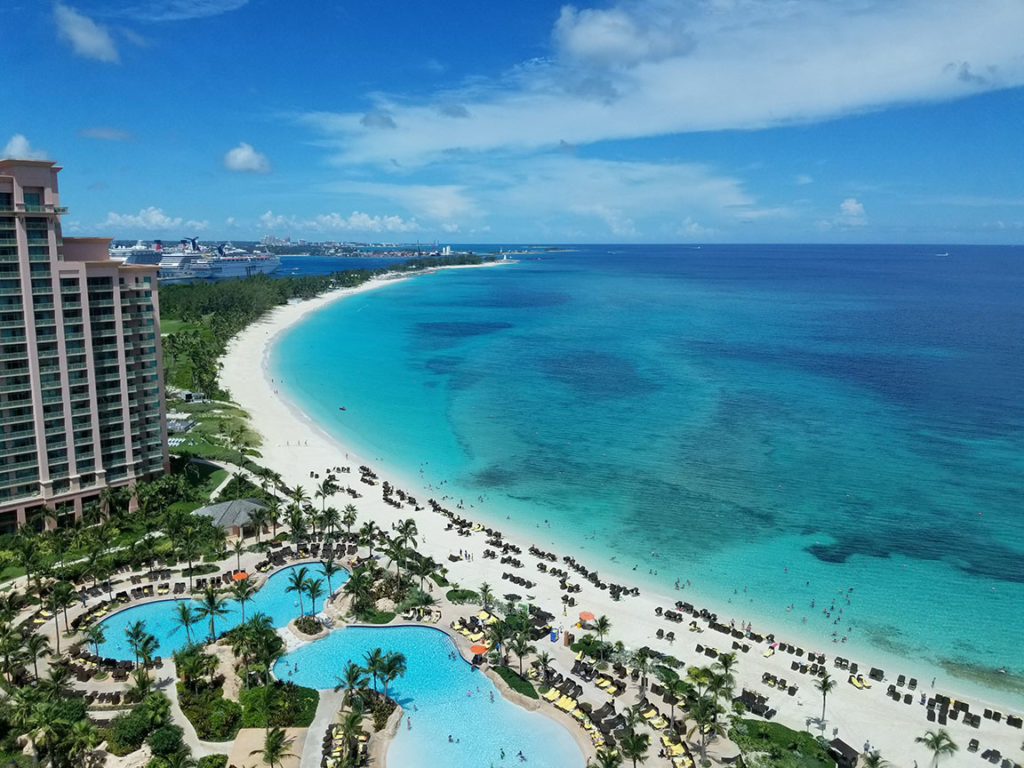 A scenic panorama of the Bahamas beach, ocean, and all inclusive vacation resorts from the Sky Bird Travel & Tours top travel destinations in 2023.