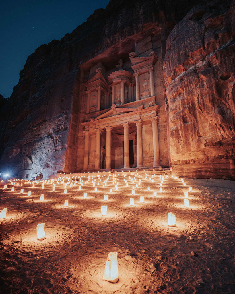 Petra at night decorated by dozens of candles in Jordan for Sky Bird Travel & Tours top travel destinations for 2023.